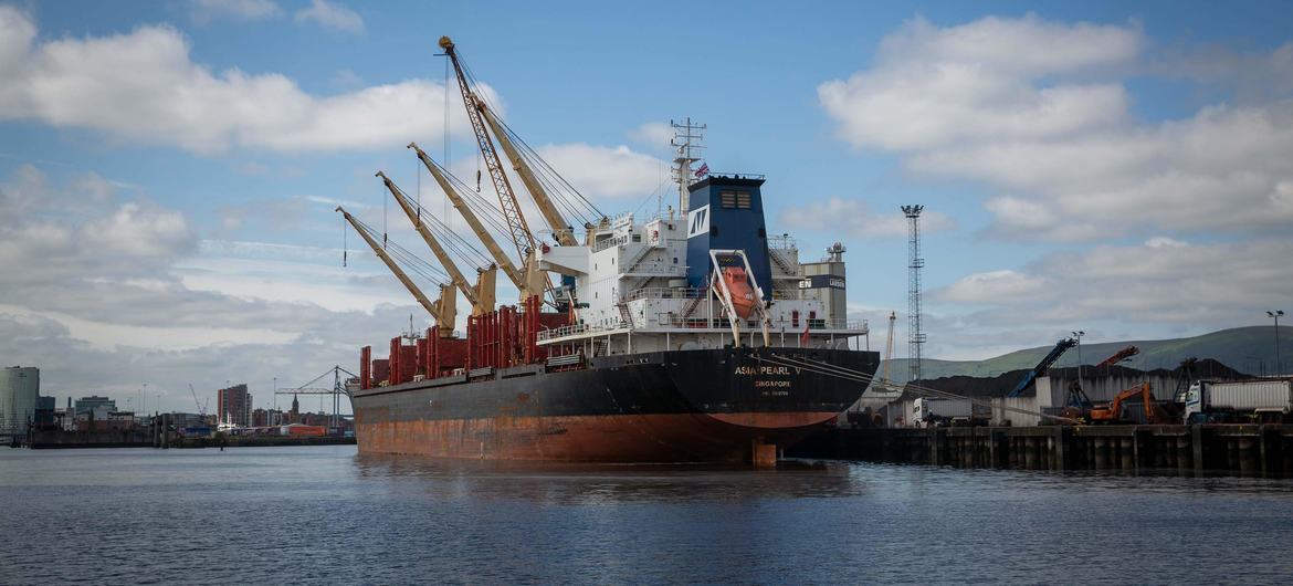 A Singaporean cargo ship docks in a northern European port, having navigated the busy East Asia-Europe transit.