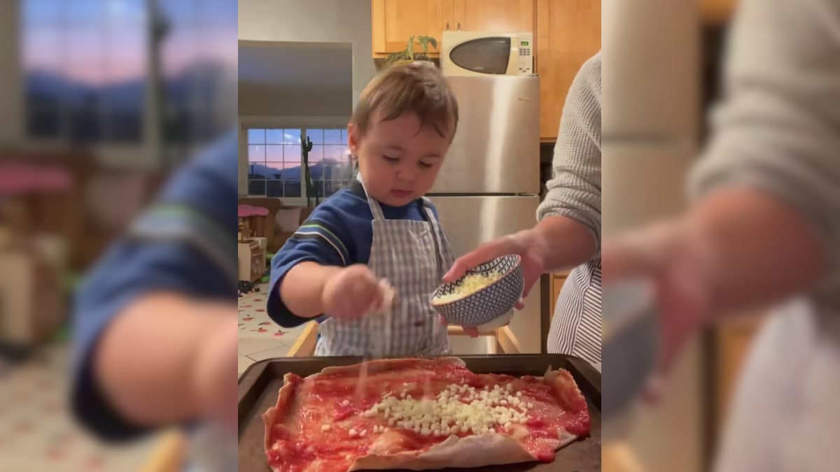 "Little Pizza Boi": Internet Cannot Get Over Toddler Preparing Pizza Pie