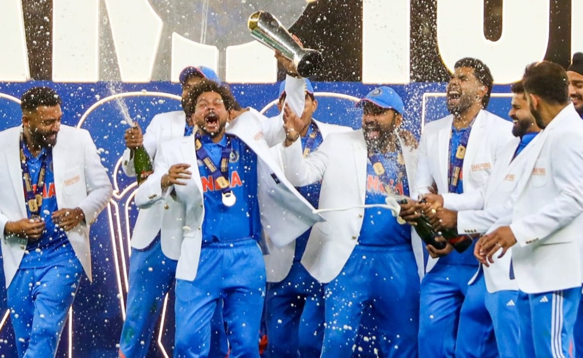 Mohammed Shami Steps Aside Amid Champagne Shower During India's Champions Trophy Celebration - Watch