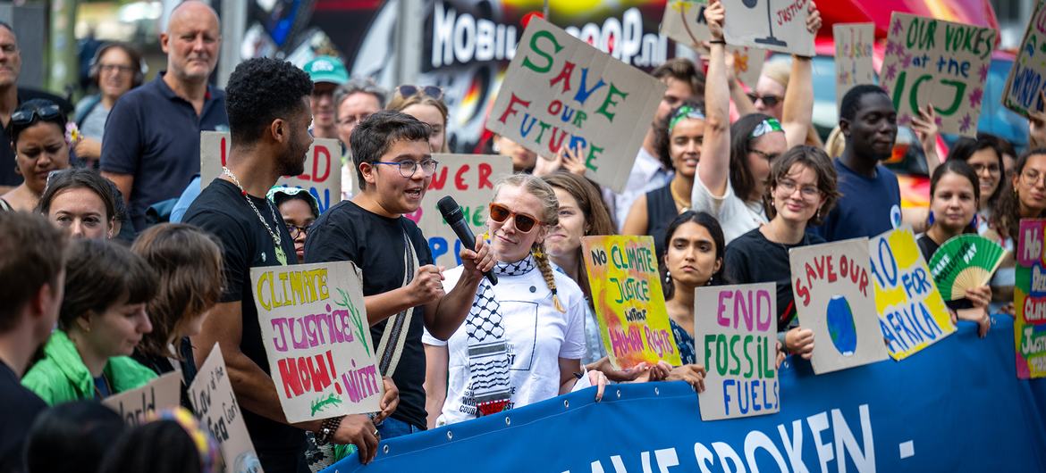 Activists outside the International Court of Justice (ICJ) in The Hague as the Court delivers its advisory opinion on the obligations of States in respect of climate change. Activists outside the International Court of Justice (ICJ) in The Hague as the Court delivers its advisory opinion on the obligations of States in respect of climate change.