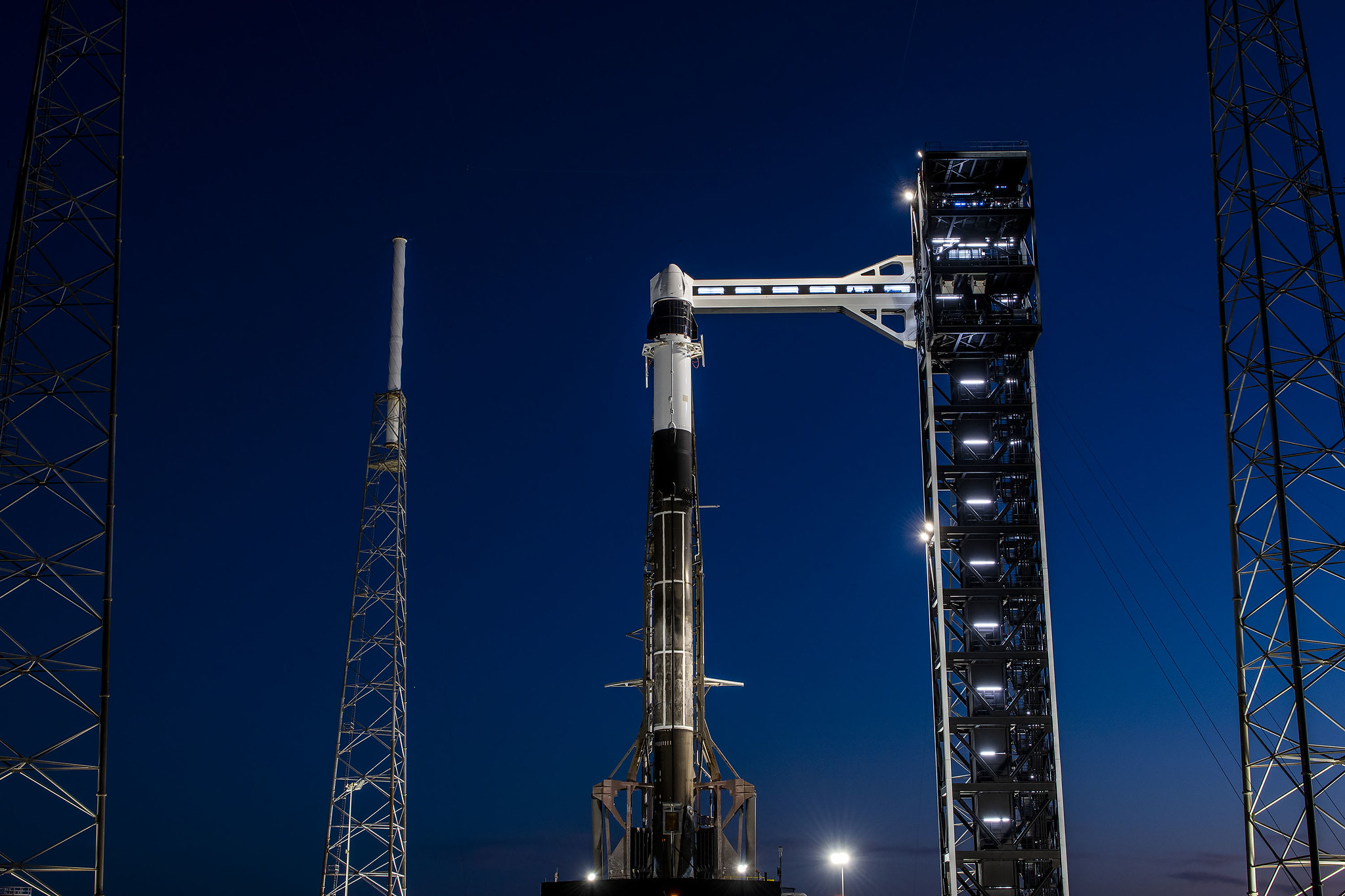 A SpaceX Falcon 9 rocket, with the company’s Dragon spacecraft, stands in a vertical position at Space Launch Complex 40 at Cape Canaveral Space Force Station in Florida on Tuesday, March 19, 2024