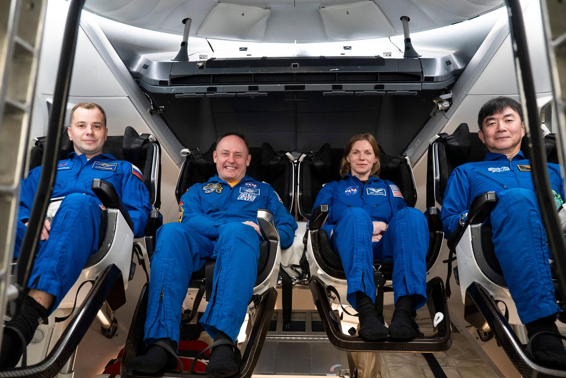 The four crew members of NASA's SpaceX Crew-11 mission to the International Space Station train inside a Dragon training crew spacecraft at SpaceX in Hawthorne, California. From left to right: Roscosmos cosmonaut Oleg Platonov, NASA astronauts Mike Fincke and Zena Cardman, and JAXA astronaut Kimiya Yui.