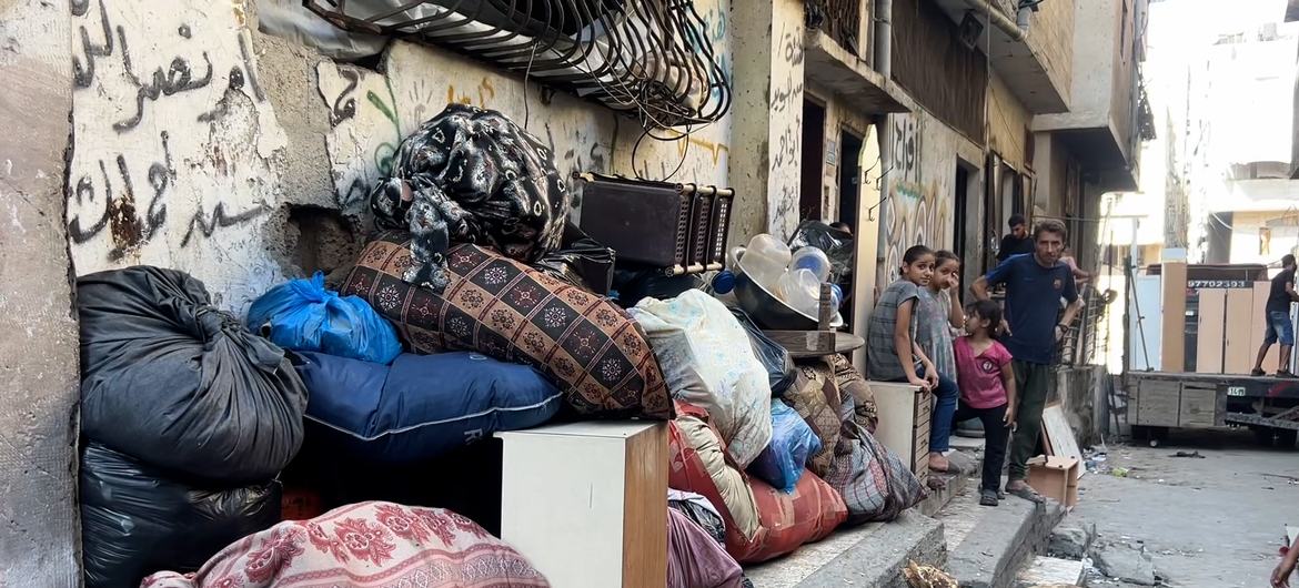 Abu Amer Al-Sharif and his family in Gaza City remove their belongings and household items from their home, preparing for yet another displacement.. Abu Amer Al-Sharif and his family in Gaza City remove their belongings and household items from their home, preparing for yet another displacement..