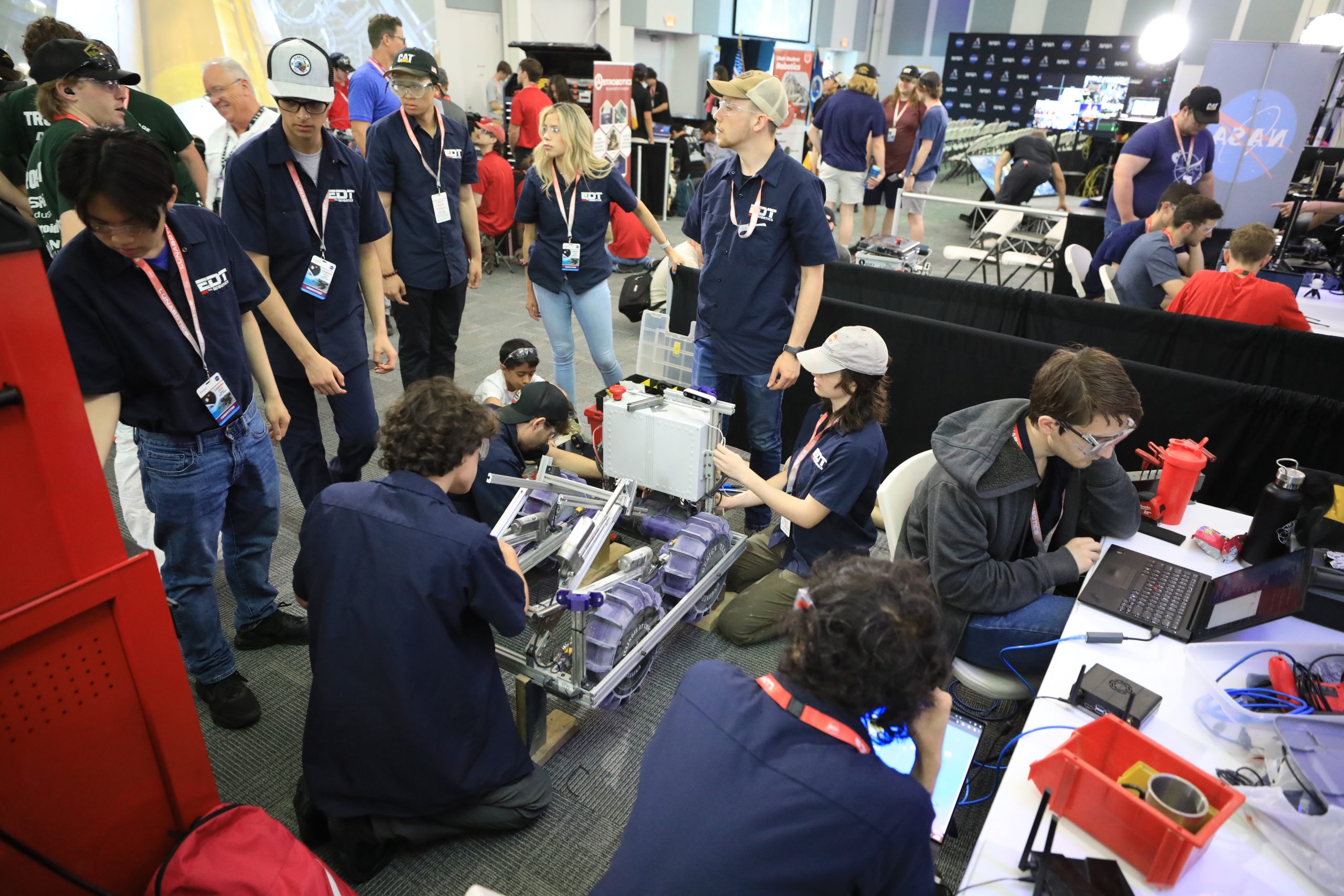 Students prepare their robots to enter Artemis Arena during NASA’s Lunabotics competition on May 20, 2025, at the Center for Space Education near the Kennedy Space Center Visitor Complex in Florida.