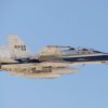 A NASA F/A-18 high-performance jet flies a mission.