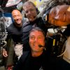 Midway through their lunar observation period on Monday, April 6, 2026, the Artemis II crew members, NASA astronauts Reid Wiseman, Victor Glover, Christina Koch, and CSA (Canadian Space Agency) astronaut Jeremy Hansen, pause to turn the camera around for a selfie inside the Orion spacecraft.