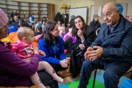 A former refugee takes on a world in flight